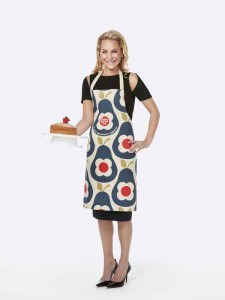 Emma Spencer wearing the Orla Kiely Sport Relief 2016 apron available from HomeSense and TK Maxx stores